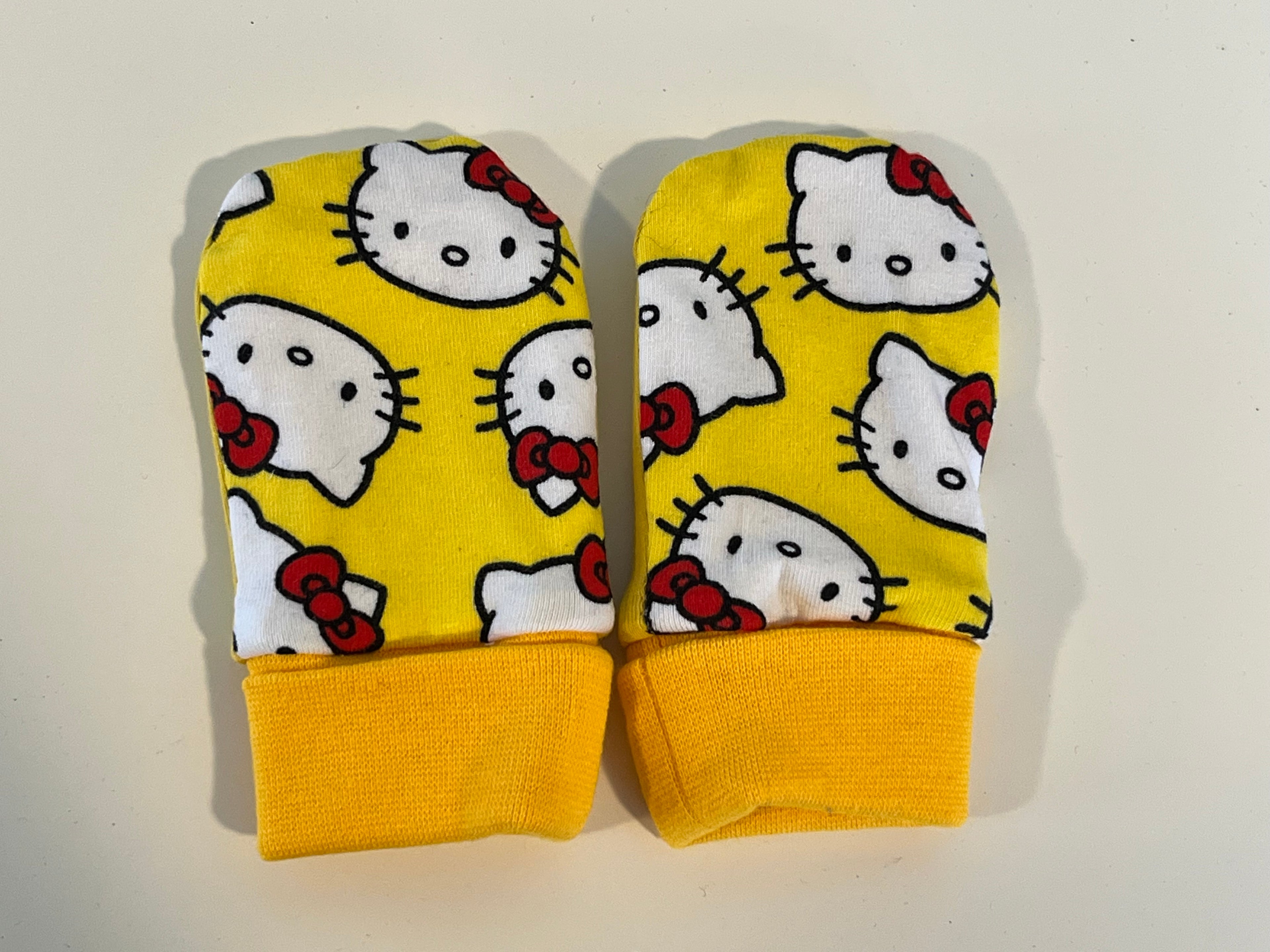 Babyvotter, katt gul